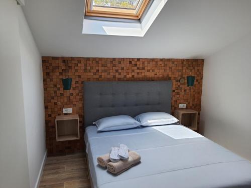 Postel nebo postele na pokoji v ubytování Apartments Krista Medveja