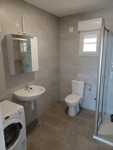 Kúpeľňa v ubytovaní APARTMANI JELIĆ