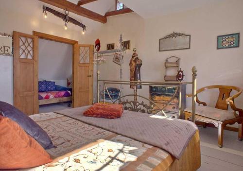 En eller flere senge i et værelse på Friedrichstadtnixe, meerchenhaftes Haus mit Sauna