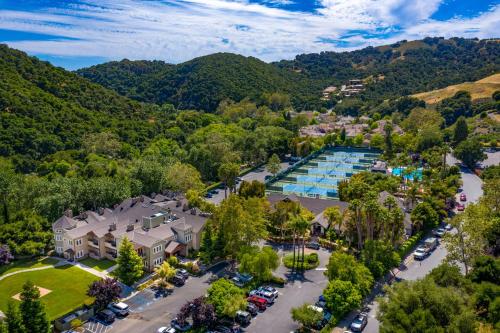 an aerial view of a resort with a pool and a parking lot at Avila Village Inn in Avila Beach