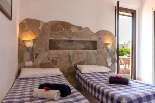 Ένα ή περισσότερα κρεβάτια σε δωμάτιο στο Pergola 705