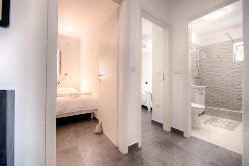 Ванная комната в Apartmani Dule Komiza