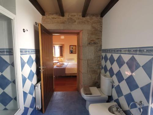 Ένα ή περισσότερα κρεβάτια σε δωμάτιο στο Casa do Peto