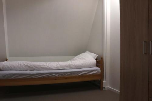 Ένα ή περισσότερα κρεβάτια σε δωμάτιο στο Budget Rooms Copenhagen