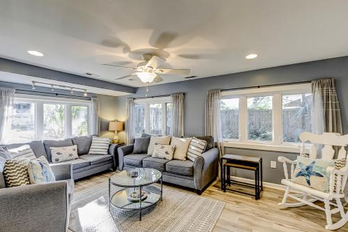 a living room with a couch and a table at 30 22nd Ave in Isle of Palms