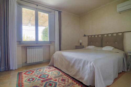 Una cama o camas en una habitación de Rinidia Bio