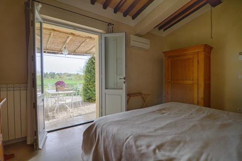 Una cama o camas en una habitación de Rinidia Bio