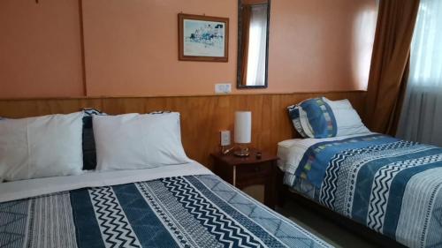 Cama o camas de una habitación en Hostal Las Heras