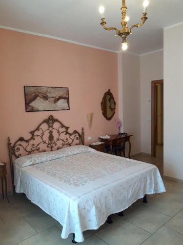 Postel nebo postele na pokoji v ubytování La casa di Catia