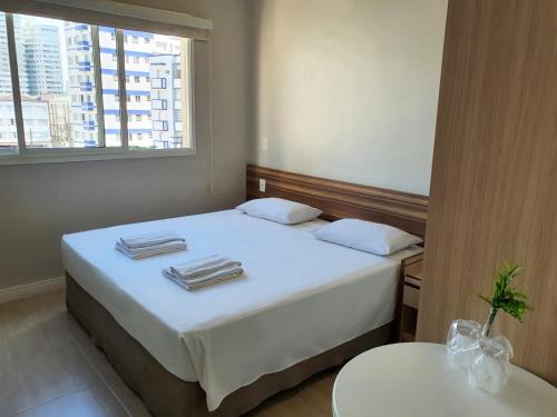 Ένα ή περισσότερα κρεβάτια σε δωμάτιο στο SW Praia Hotel