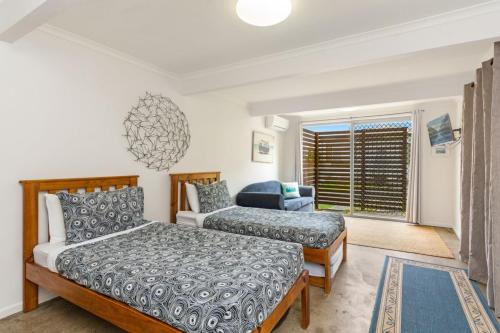 Ένα ή περισσότερα κρεβάτια σε δωμάτιο στο Convent Cottage - Pet friendly home in the centre of town