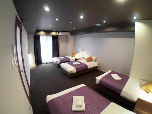 En eller flere senger på et rom på Hotel S-Presso West - Vacation STAY 9085
