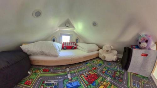 Säng eller sängar i ett rum på Ferien im Tiny House
