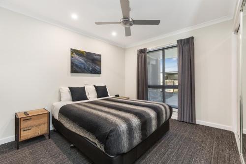Posteľ alebo postele v izbe v ubytovaní Allara Motor Lodge