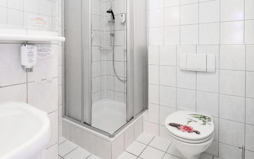 Ванная комната в Hotel Haus Borkum
