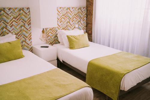 Postel nebo postele na pokoji v ubytování Top'Otel