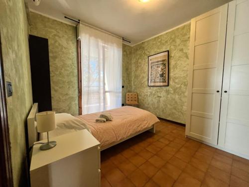 Posteľ alebo postele v izbe v ubytovaní Silicella Apartment