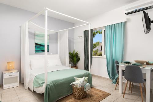 A bed or beds in a room at ''Meraviglia casa'' Irida apartment