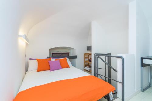 Postel nebo postele na pokoji v ubytování Pura Vida Duplex by Wonderful Italy
