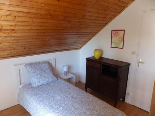 Ένα ή περισσότερα κρεβάτια σε δωμάτιο στο Duplex 4 personnes La Calypso