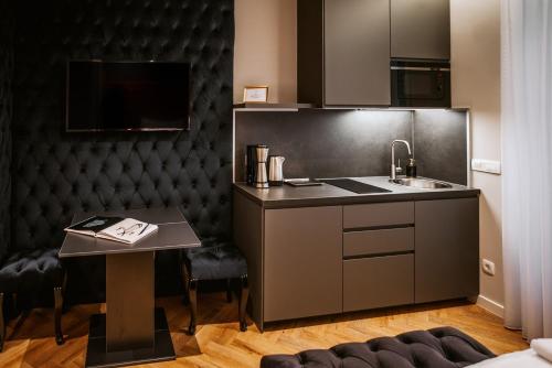Kjøkken eller kjøkkenkrok på Bresidence Apartments with free private parking