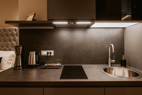 Bresidence Apartments with free private parkingにあるキッチンまたは簡易キッチン