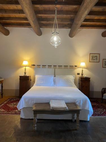 A bed or beds in a room at Tenuta di Santa Lucia