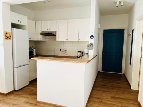 Cuina o zona de cuina de Ocean Sunset Apartment