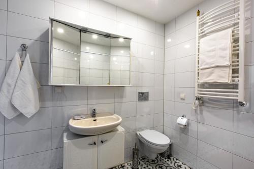Koupelna v ubytování Apartamentai Laima