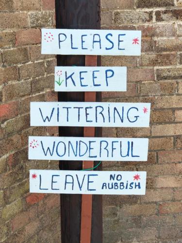 a sign that says please keep winteruating wonderfull and leave no basil at The Shack in East Wittering