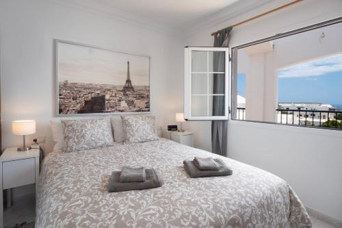 Postel nebo postele na pokoji v ubytování Comfortable and modern apartment next to the Avenida central in Tías