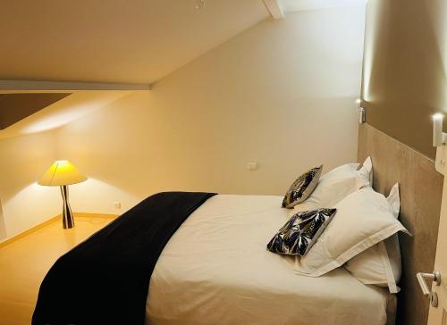 Katil atau katil-katil dalam bilik di Appartement cosy avec jacuzzi à Plaimbois-du-Miroir, 70 m²