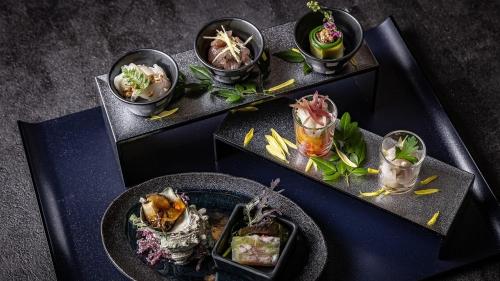 a group of three plates of food on a table at AWA Nishi-Izu in Numazu