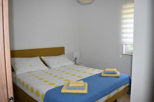 Posteľ alebo postele v izbe v ubytovaní Apartment Vapor