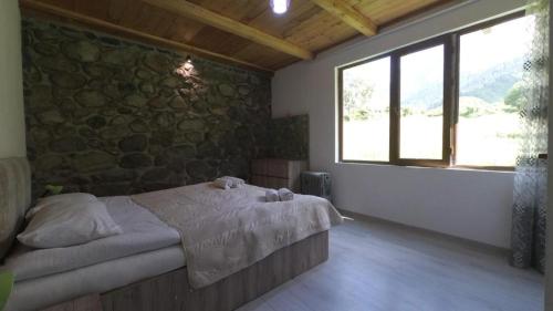 Postel nebo postele na pokoji v ubytování Peak Mazeri Guest House