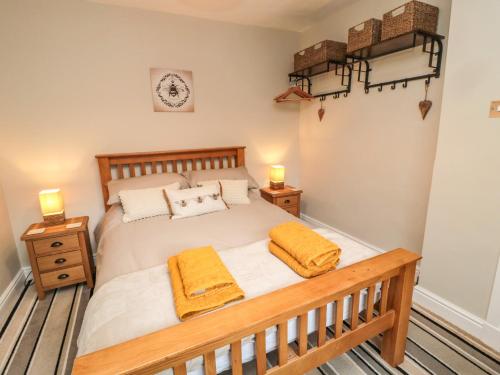 Ένα ή περισσότερα κρεβάτια σε δωμάτιο στο Borders Cottage