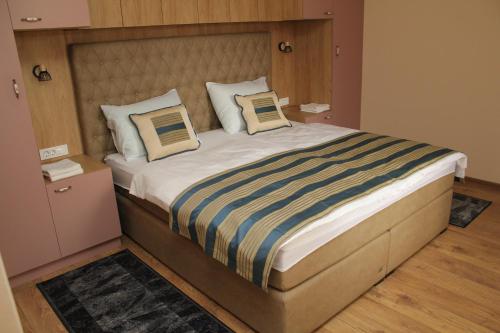 Llit o llits en una habitació de COUNTRY HOUSE ERDUT