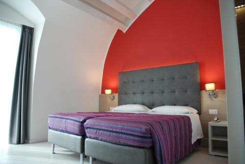 Katil atau katil-katil dalam bilik di Hotel Lugano Torretta