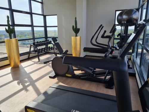 a gym with treadmills and a treadmill at U Parkhotel in Enschede