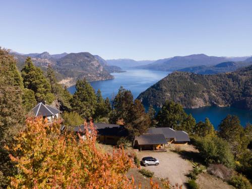 a view of a lake from a mountain at Arrayan Lake View Mountain Lodge & Casa De Te Arrayan in San Martín de los Andes