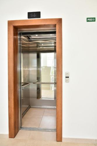 an elevator door in an office building at Apto Juan Dolio Tepuy 601 F in Juan Pedro