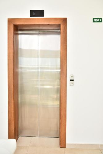 an elevator door in an office building at Apto Juan Dolio Tepuy 601 F in Juan Pedro
