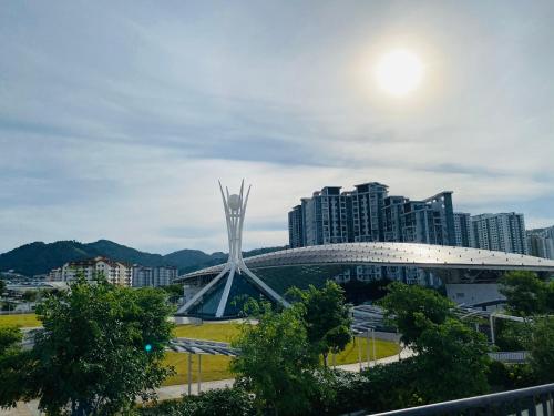 a view of a stadium in a city with buildings at Spice Tunas 3B2B House in Bayan Lepas