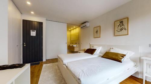 Un pat sau paturi într-o cameră la Casa do Bosque