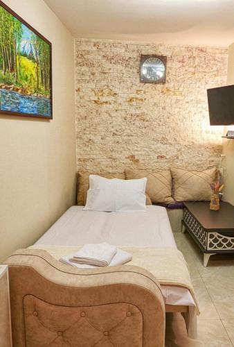 Postel nebo postele na pokoji v ubytování Ideal Home