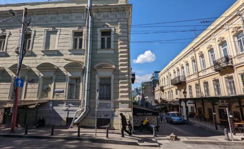 a group of buildings on a city street at Ideal Home in Tbilisi City