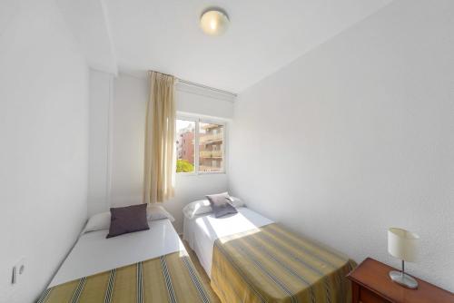 Postel nebo postele na pokoji v ubytování Apartamentos Maja