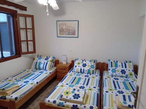 Llit o llits en una habitació de Fantastic House with a Wonderful View of the Sea