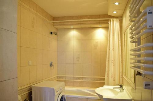 Ein Badezimmer in der Unterkunft Holiday flat, Ustka