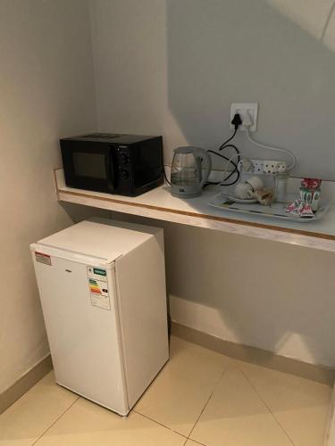 Dapur atau dapur kecil di Acquila Guest House